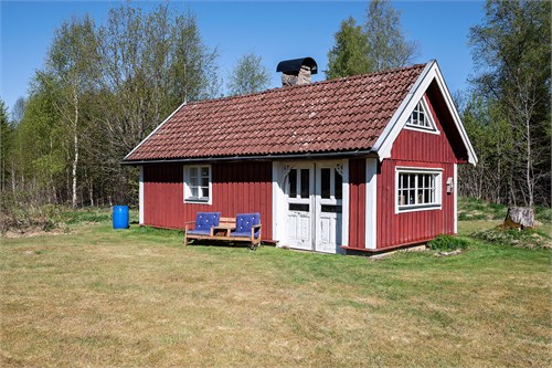 Gäststugan med gästrum och grillplats