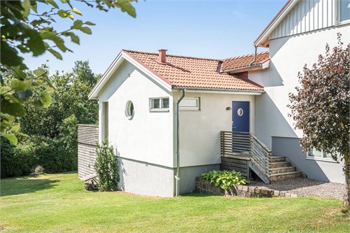 Tillbyggnadsdel med trädgårdsentré