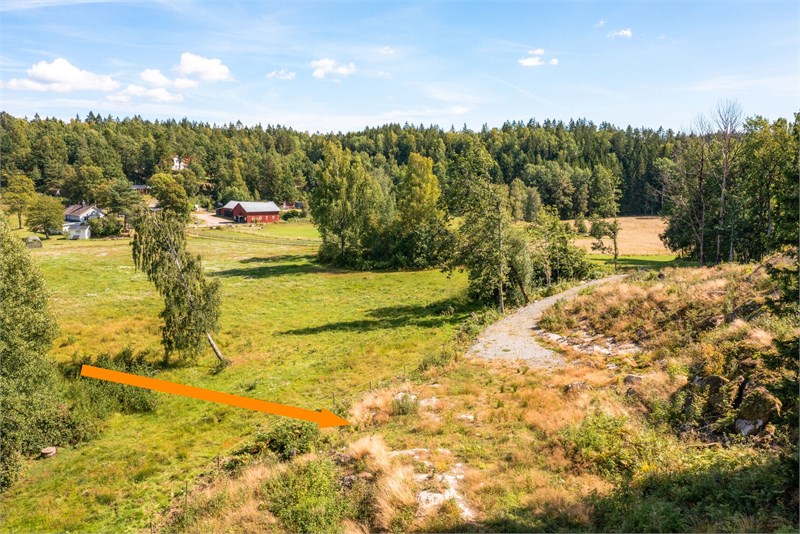 Pilen visar möjlig placering av hus